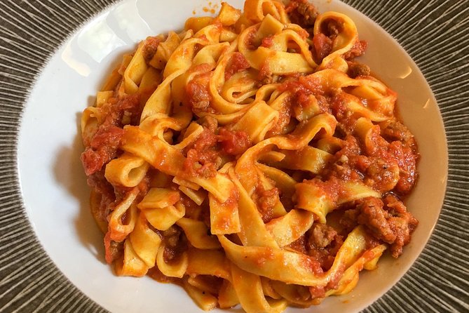 Bologna: Full meal Food Tour with Local Delights by Do Eat Better - Via dell’Indipendenza: tigelle and mortadella, two iconic choices