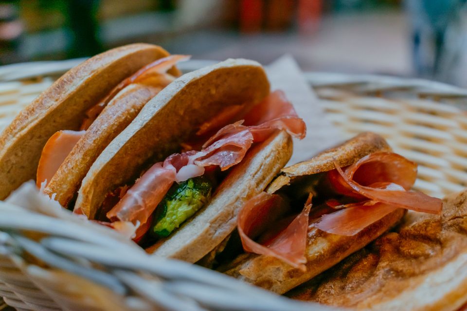 Bologna: Private Food Walking Tour with Tastings - City highlights in between bites: walking with purpose