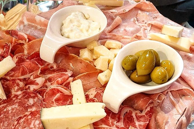 Bologna: the red medieval pearl and its delicious food (private tour) - Basilica di San Petronio: silk routes, daily life, and mortadella links