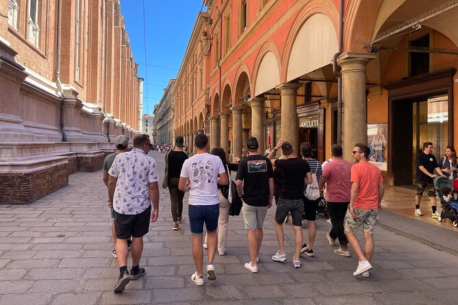 Bologna: Walking Food Tour and Highlights with a Local Guide - Mortadella and Wine: Your First Bolognese Lesson (Bread, Then Bite)